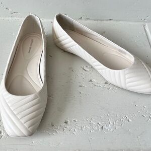 White ballet flats
